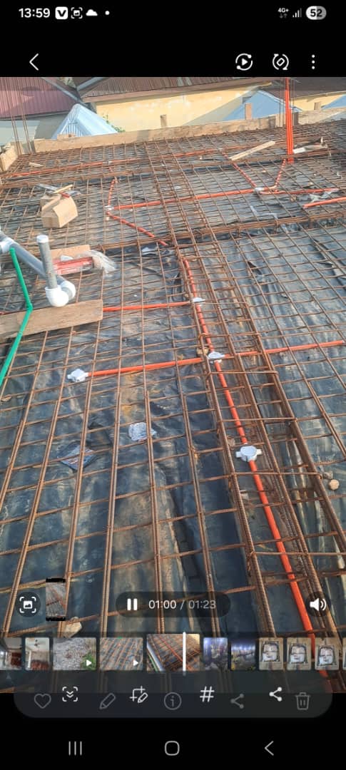 Conduits arranged within construction reinforcement