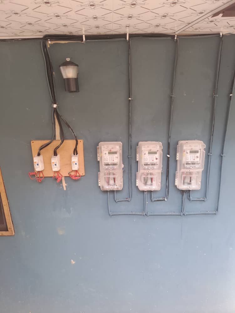 Wall-mounted electrical meters and wiring